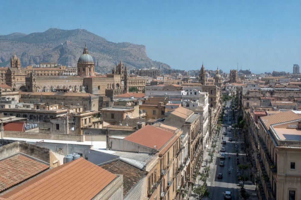 Panorama of Palermo's historic centre with mountains rising behind the city